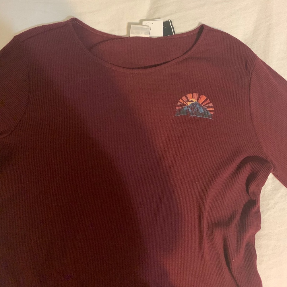 Red long sleeved top